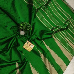 Gauri collection: Bottle Green & Cream Handcrafted Raw Silk Saree with Temple Border