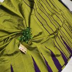 Gauri collection:  Mehndi green & Black Handcrafted Raw Silk Saree with Temple Border